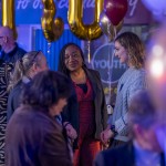 People chatting at the event People at the event